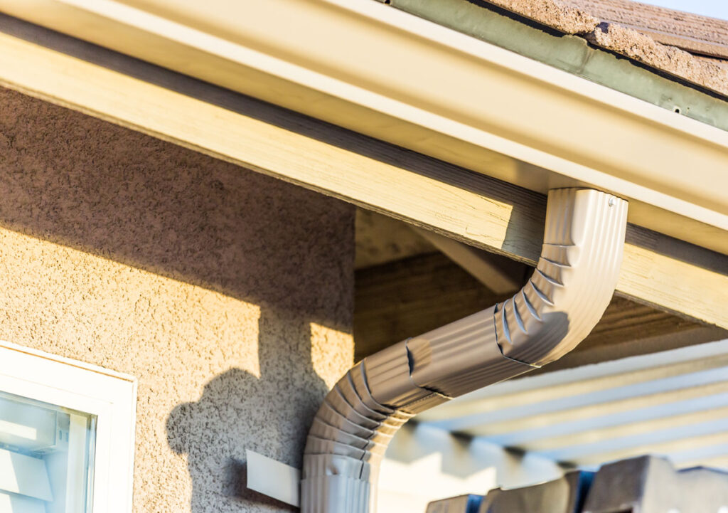 How Gutter Guards Extend the Life of Seamless Gutters in Electric City SC 1 Traditional gutters showing seams and joints in Electric City SC