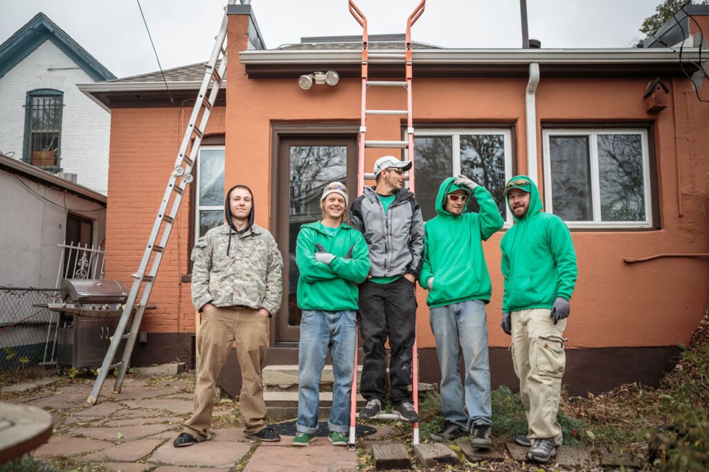 Gutter Cleaning Anderson SC 1 Anderson SC gutter cleaning team removing debris