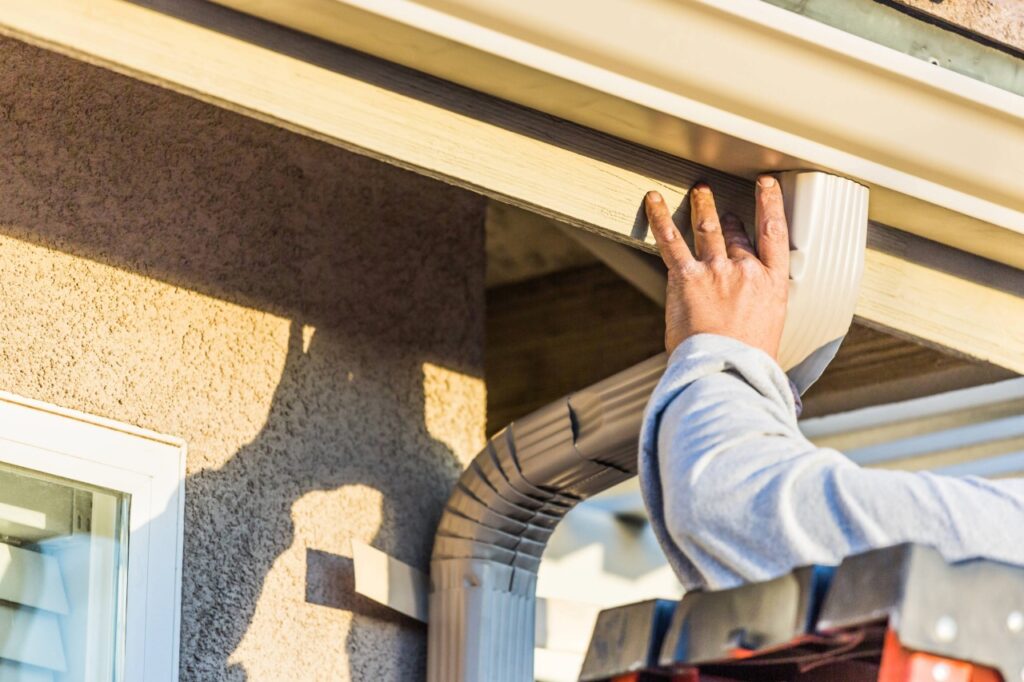 Gutter Inspection Anderson SC Homeowners Trust 2 gutter inspection Anderson SC technician checking gutter alignment and slope